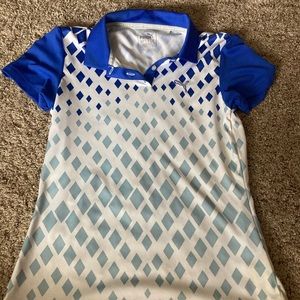 Golf Polo by the brand Puma. Slick and sweat absorbent